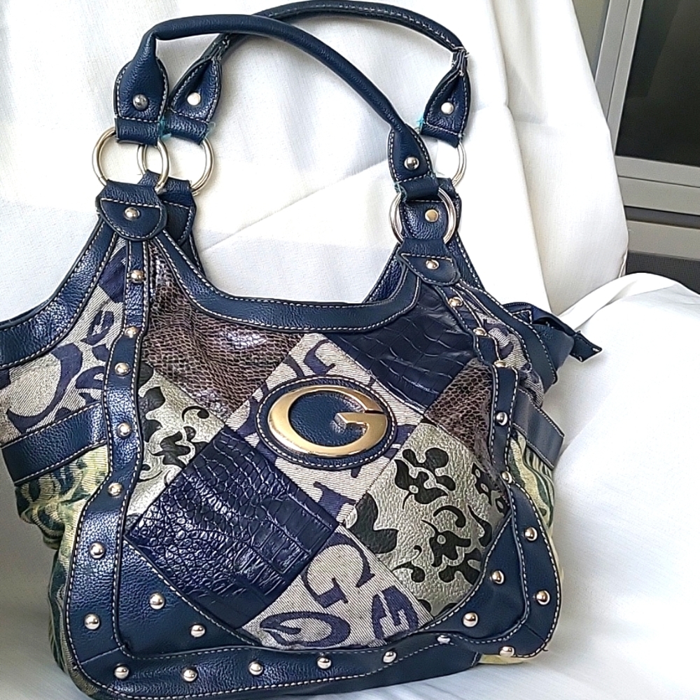 Guess Jean shoulder bag with easy access pockets on sides